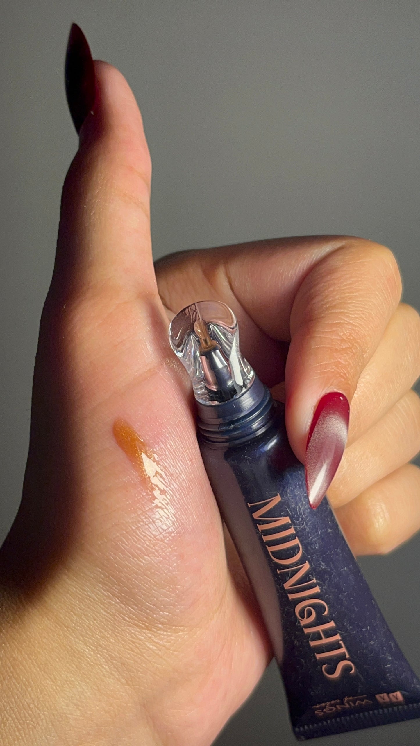 MIDNIGHT LIPGLOSS